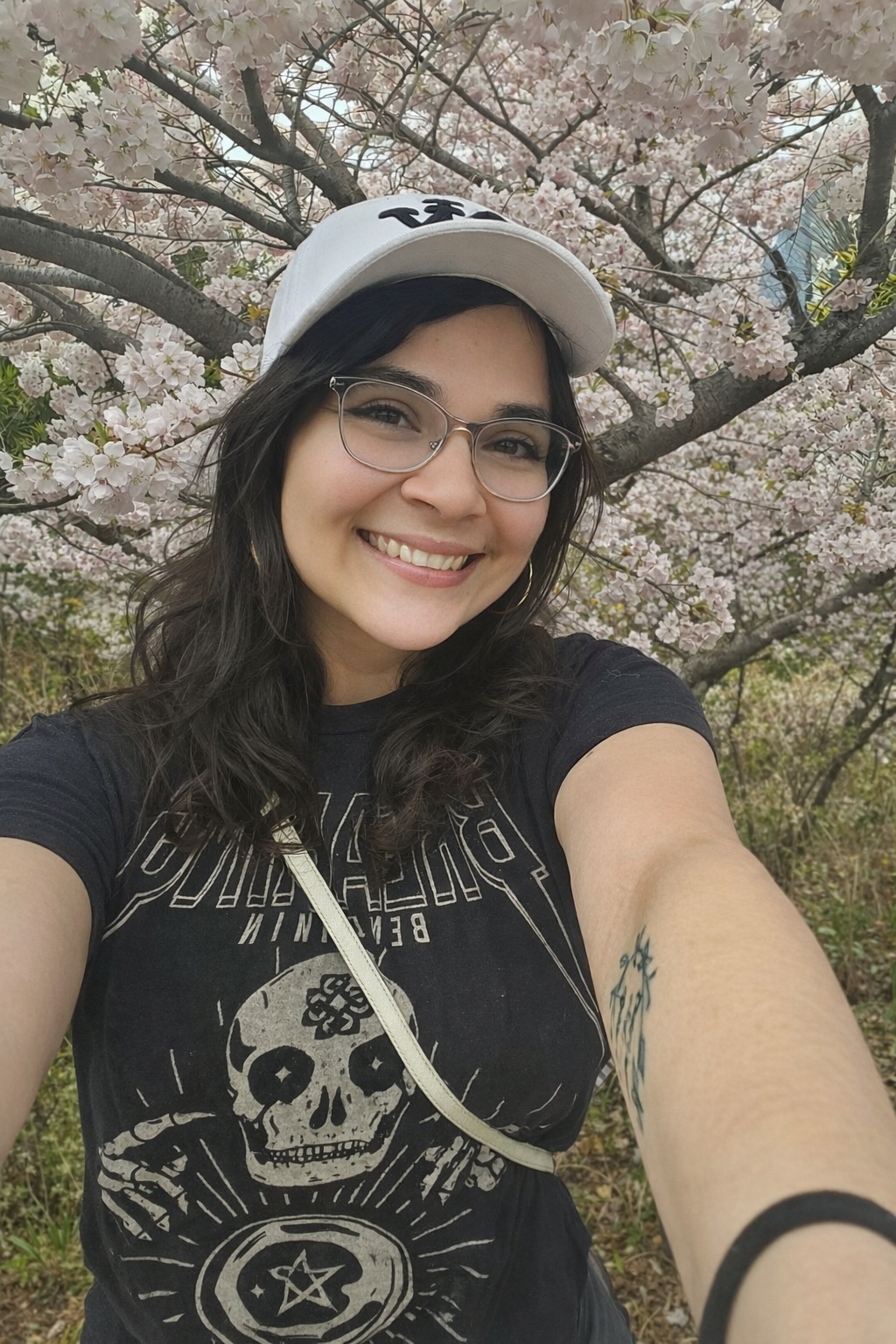 Lacy standing in front of flowers